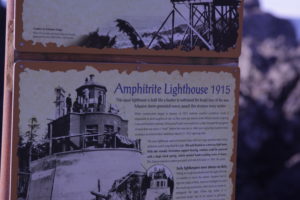 Trail sign explaining Amphitrate Lighthouse